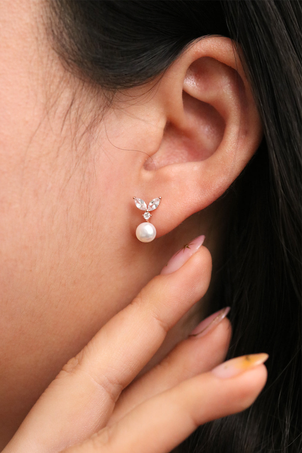 Pearl leaf drop earrings – styling detail